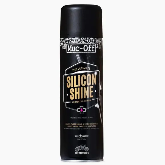 Черна аерозолна кутия Muc-Off Silicon Shine 500ml със златисти букви и лого на марката на бял фон