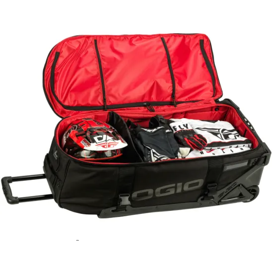 Сив сак с колела OGIO RIG 9800 PRO в дизайн CHAOS с черни презрамки, телескопична дръжка и включени черна раница и чанта за ботуши с ярко зелени логота