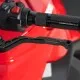 Два червени алуминиеви лоста B-LUX с гланцово анодизирано покритие, удължена форма и кръгъл отвор в края
