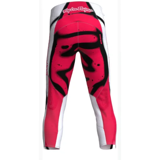 Бял детски мотокрос брич Troy Lee Designs с черни акценти, розови детайли, кожени панели на коленете и TLD лого на краката