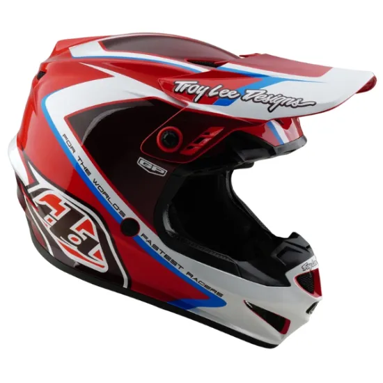 Червено-бяла детска мотокрос каска Troy Lee Designs GP Shutter с контрастни сини елементи, черен визьор и характерните TLD лога