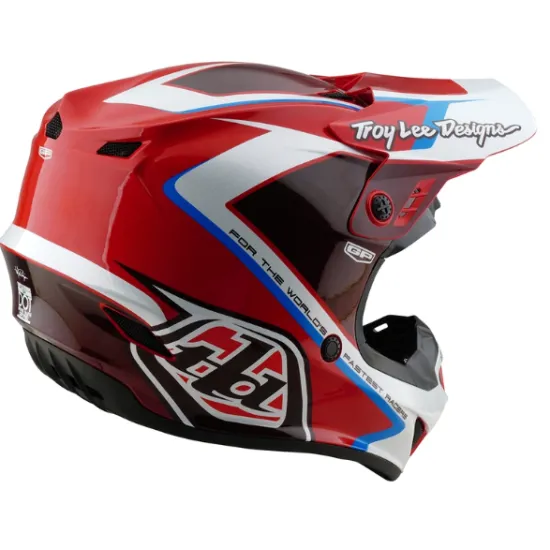 Червено-бяла детска мотокрос каска Troy Lee Designs GP Shutter с контрастни сини елементи, черен визьор и характерните TLD лога