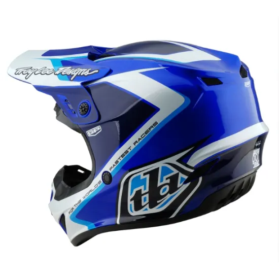Детска мотокрос каска Troy Lee Designs GP Shutter в синьо-бяла цветова схема с геометричен дизайн, издължен визьор и множество вентилационни отвори