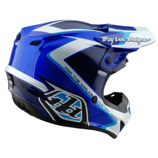 Детска мотокрос каска Troy Lee Designs GP Shutter в синьо-бяла цветова схема с геометричен дизайн, издължен визьор и множество вентилационни отвори