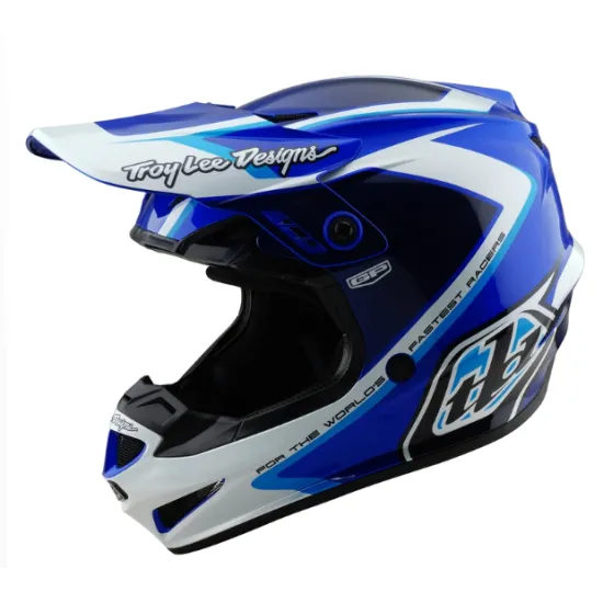 Детска мотокрос каска Troy Lee Designs GP Shutter в синьо-бяла цветова схема с геометричен дизайн, издължен визьор и множество вентилационни отвори