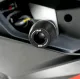 Черни краш тапи R&G Racing с капковидна форма, монтирани на бяло-червен Aprilia RS 457, с видимо лазерно гравирано лого