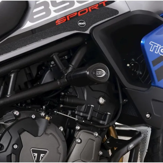 Черни краш тапи R&G Racing монтирани на сива Triumph Tiger 850 Sport, показващи капковидните елементи и интеграцията с рамката на мотоциклета