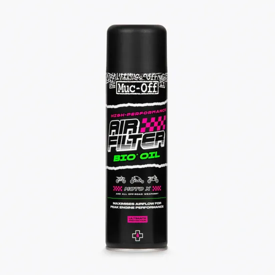 Черен аерозолен флакон Muc-Off Air Filter Bio Oil 500мл с розово и зелено лого, предназначен за мотокрос и офроуд