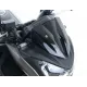 Черен адаптер R&G Racing за микро мигачи монтиран на Kawasaki мотоциклет с видими крепежни елементи и компактен цилиндричен дизайн
