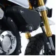 Черни краш тапи R&G Racing Aero монтирани на Honda Monkey 125 с златни предни вилки и видими лога на производителя