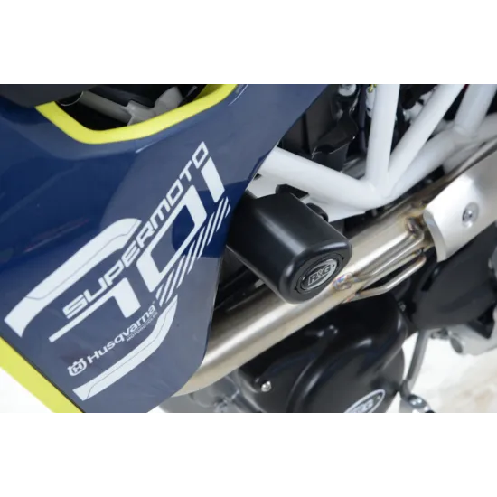 Черни аеродинамични краш тапи R&G Racing монтирани на синя Husqvarna 701 Supermoto с бяла рамка и капковидни бобини