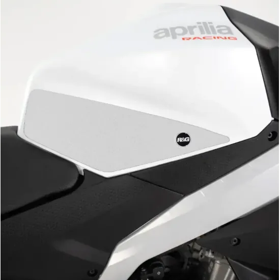 Прозрачни подложки за резервоар R&G Racing монтирани на бял Aprilia RS 457, с видимо лого на R&G и надпис aprilia RACING