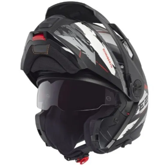 Сива адвенчър каска SCHUBERTH E2 Trail Grey с бяло-червен дизайн, регулируема козирка, двоен подбрадник и вентилационни отвори
