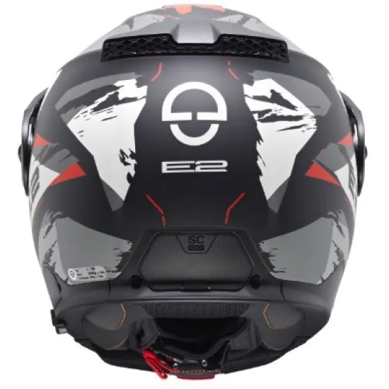 Сива адвенчър каска SCHUBERTH E2 Trail Grey с бяло-червен дизайн, регулируема козирка, двоен подбрадник и вентилационни отвори