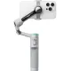 Сребрист видео стабилизатор Insta360 Flow 2 Pro с черен смартфон в щипка, показан в изправено положение с разгънат трипод и телескопична дръжка