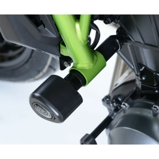 Черни краш тапи R&G Racing с капковидна форма монтирани на зелена рамка на Kawasaki Z650, показващи R&G лого и скрити фитинги