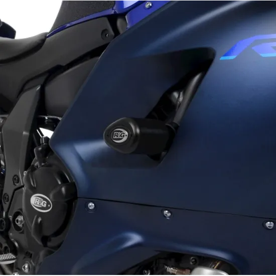 Черни краш тапи R&G Racing с капковидна форма монтирани на синя Yamaha R7, показващи аеродинамичния дизайн и логото R&G