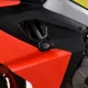 Черни краш тапи R&G Racing Aero монтирани на червено-черен обтекател на Aprilia RS660 с видимо лого R&G върху бобината