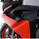 Черни краш тапи R&G Racing Aero монтирани на червено-черен обтекател на Aprilia RS660 с видимо лого R&G върху бобината