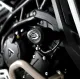 Черна краш тапа R&G Racing Aero Style с бяло лого, монтирана на двигателен капак на Triumph Tiger 900, снимка отблизо