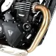 Черни краш тапи R&G Racing Aero монтирани в рамката на Triumph Speed 400 до бронзовата изпускателна тръба