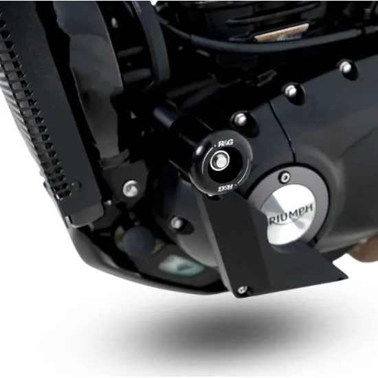 Черни краш тапи R&G Racing Aero монтирани в рамката на Triumph Speed 400 до бронзовата изпускателна тръба