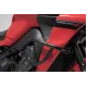 Черни стоманени защитни дъги SW-MOTECH монтирани на червен мотоциклет Yamaha Tracer 9 GT+ около двигателя и радиатора