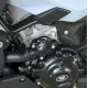Черни протектори за двигател R&G Racing монтирани на BMW S1000XR, показващи защита на водната помпа, генератора и съединителя с характерното бяло лого на марката