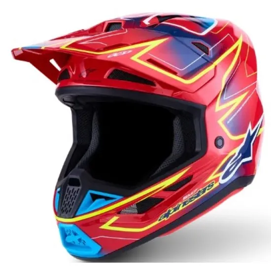 Alpinestars SM7 Cast мотокрос каска в червено с жълти и сини графики, изглед отстрани и отгоре, композитна черупка с