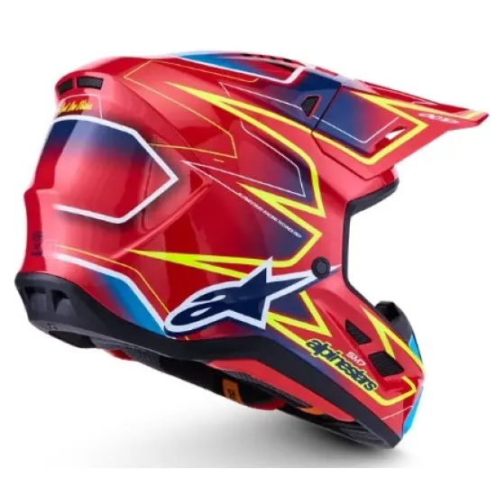 Alpinestars SM7 Cast мотокрос каска в червено с жълти и сини графики, изглед отстрани и отгоре, композитна черупка с